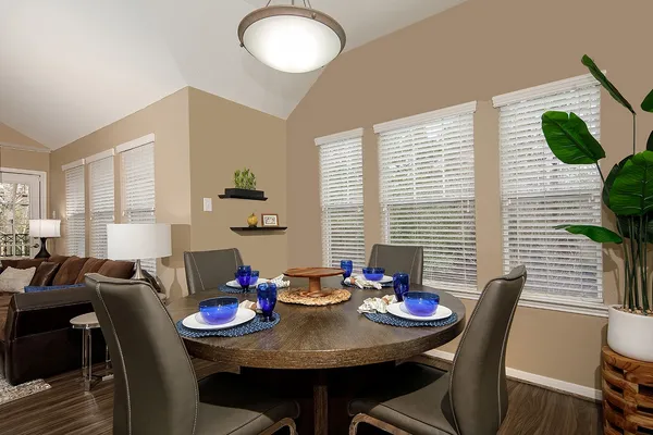 a view of a dining room with furniture