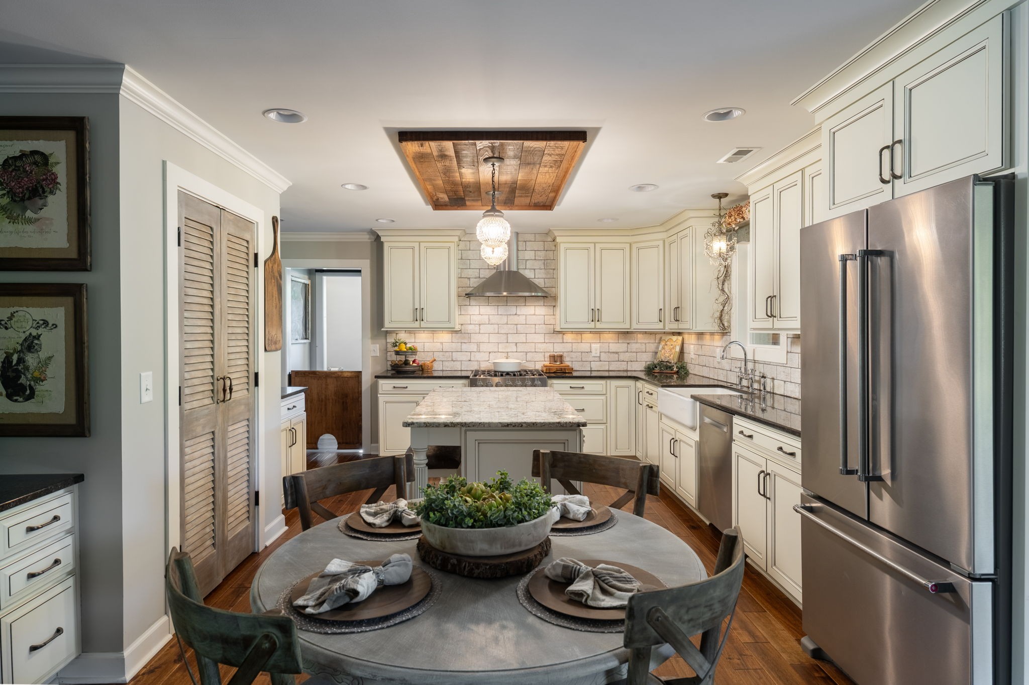 1496 Coleman Road Franklin, TN 37064 - Photo 13 of 73 a kitchen with a refrigerator and a stove