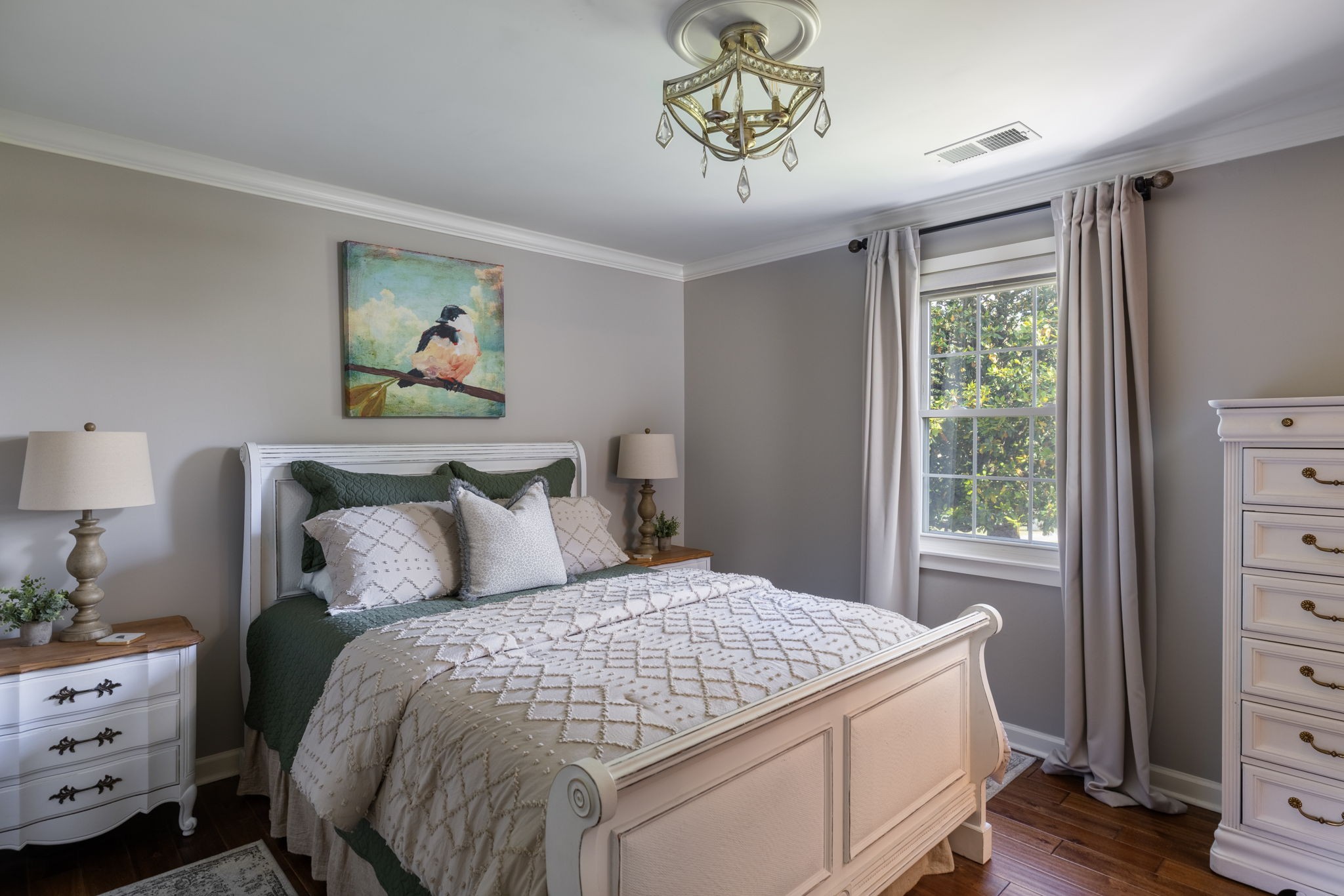 1496 Coleman Road Franklin, TN 37064 - Photo 28 of 73 a bedroom with a bed and a painting on the wall