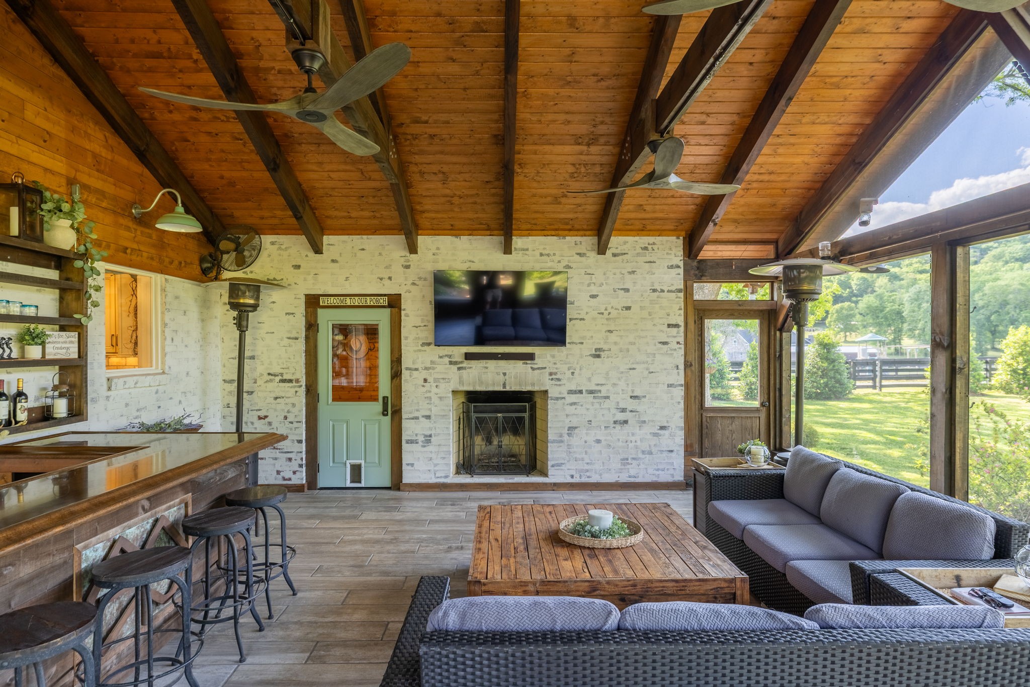 1496 Coleman Road Franklin, TN 37064 - Photo 37 of 73 a living room with furniture and a fireplace