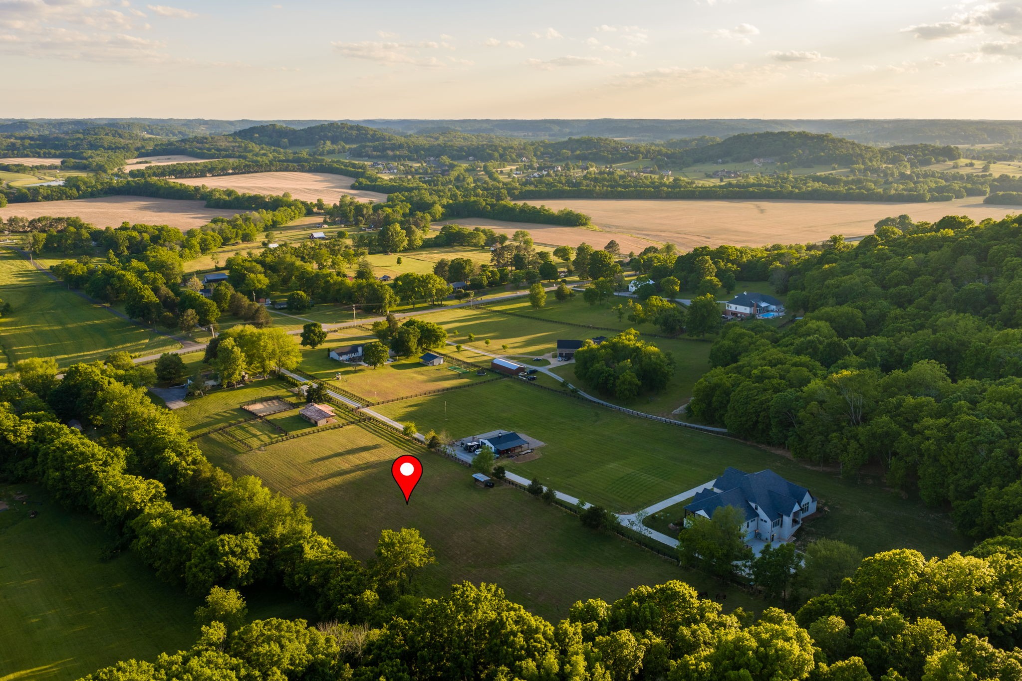 1496 Coleman Road Franklin, TN 37064 - Photo 70 of 73 an aerial view of residential houses with outdoor space and swimming pool