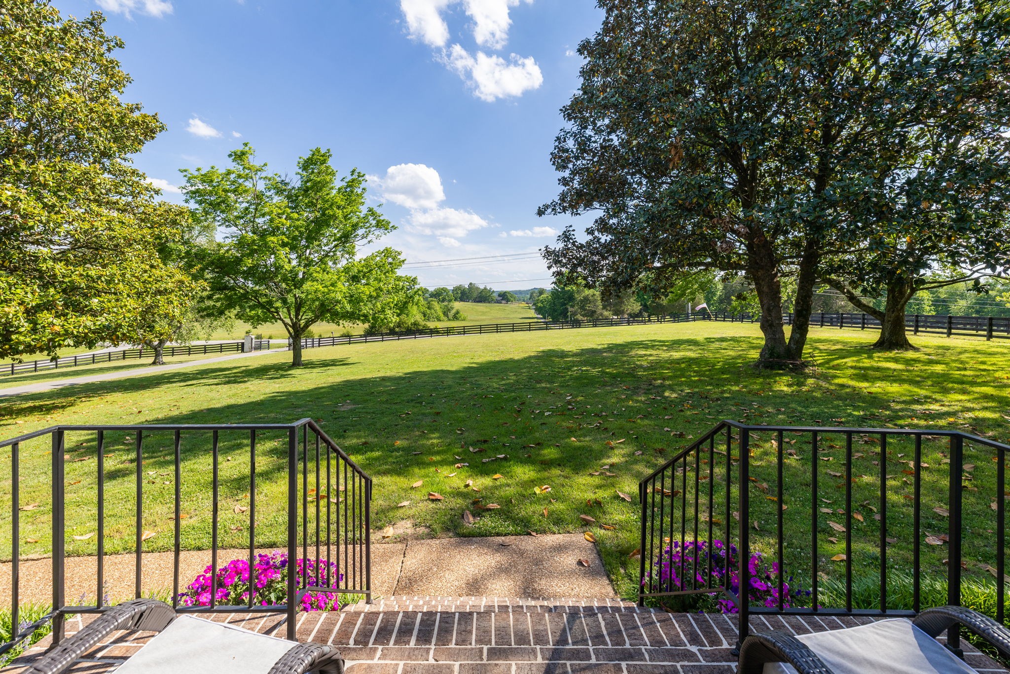 1496 Coleman Road Franklin, TN 37064 - Photo 7 of 73 a view of lawn chairs and couches in a patio