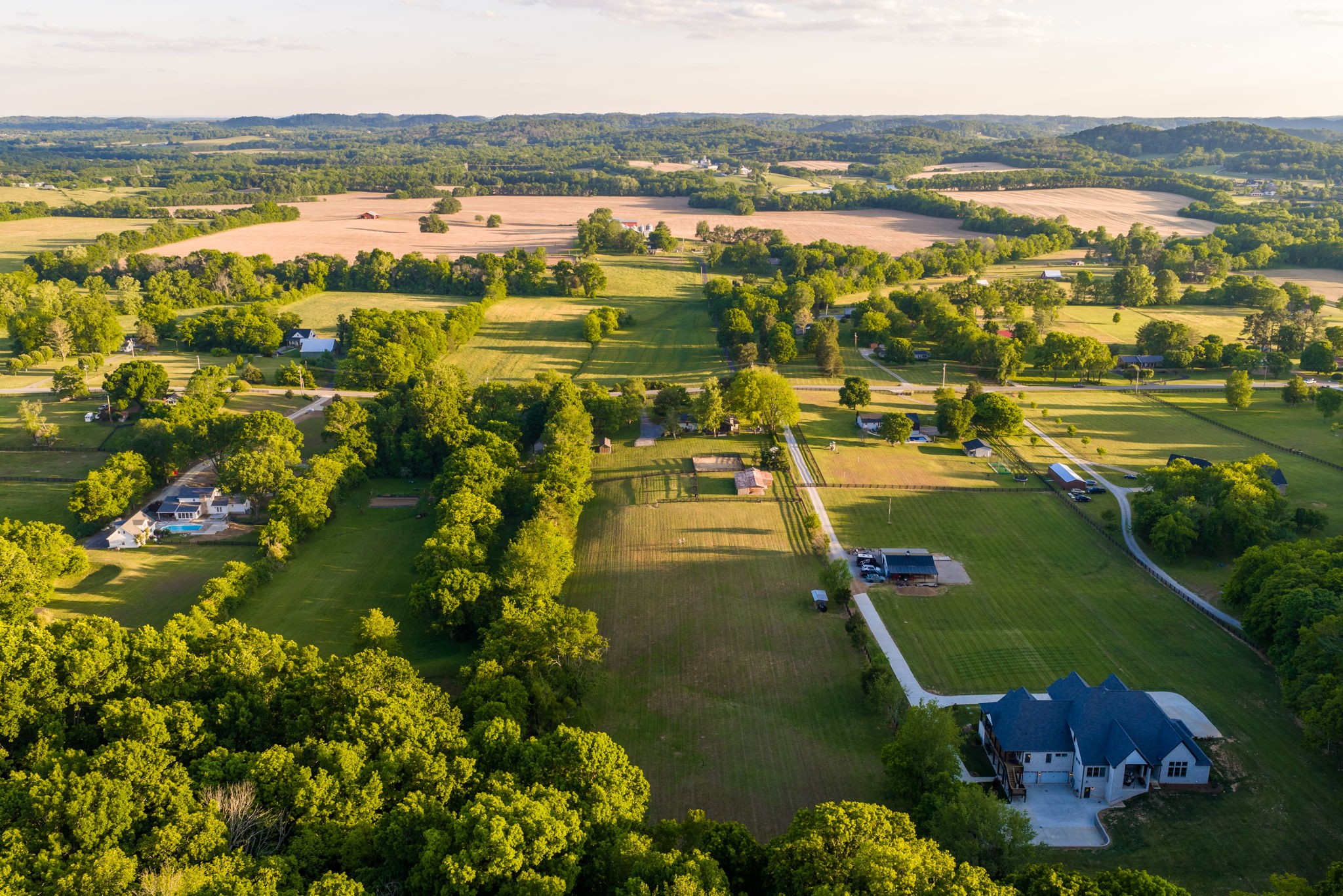 1496 Coleman Road Franklin, TN 37064 - Photo 72 of 73 an aerial view of residential houses with outdoor space and river