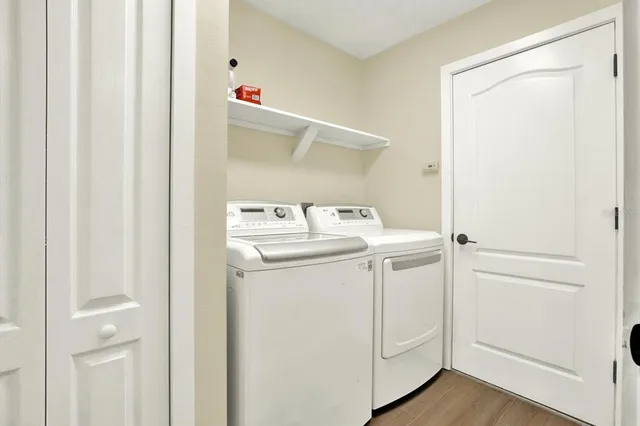 a utility room with dryer and washer
