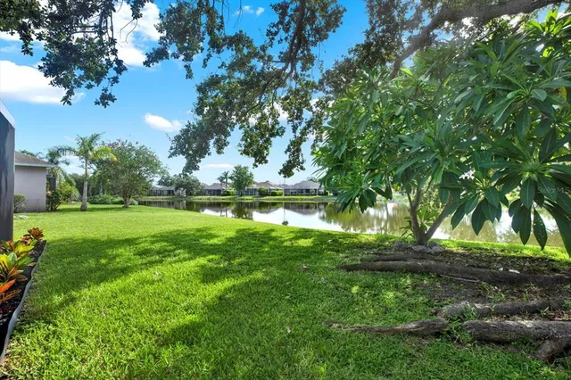 a view of outdoor space with deck and yard