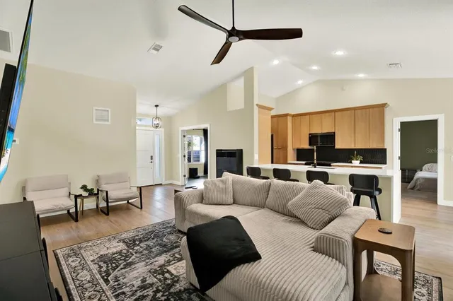 a large living room with furniture