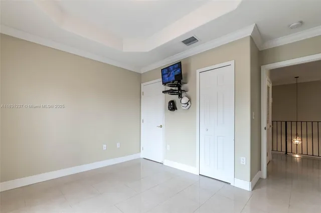 a room with cabinets and a wooden floor