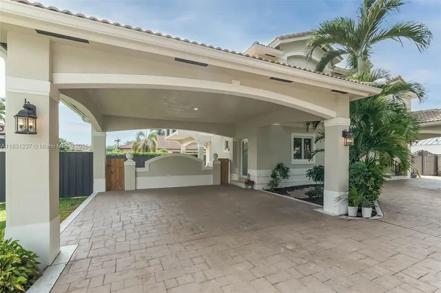 a view of front door with wooden floor