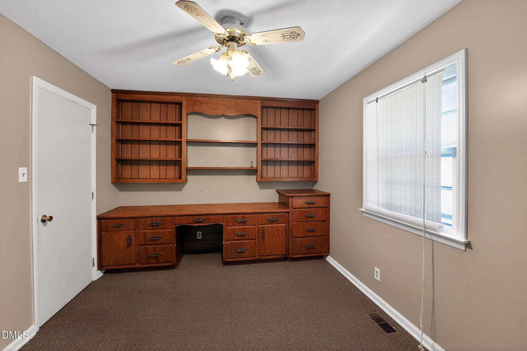 1034 Jerome Road Durham, NC 27713 - Photo 32 of 35 a room with furniture and window