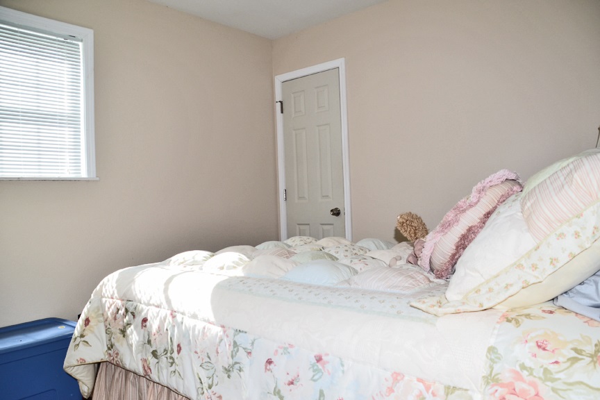 6727 Theodorff Road Pecatonica, IL 61063 - Photo 12 of 16 a bedroom with a bed and a window