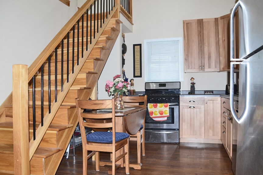 6727 Theodorff Road Pecatonica, IL 61063 - Photo 14 of 16 a view of kitchen with furniture and wooden floor