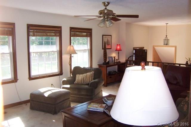 2316 Golf Course Road, Unit P8871 & P88151 Columbus, NC 28722 - Photo 13 of 21 a living room with furniture and a large window