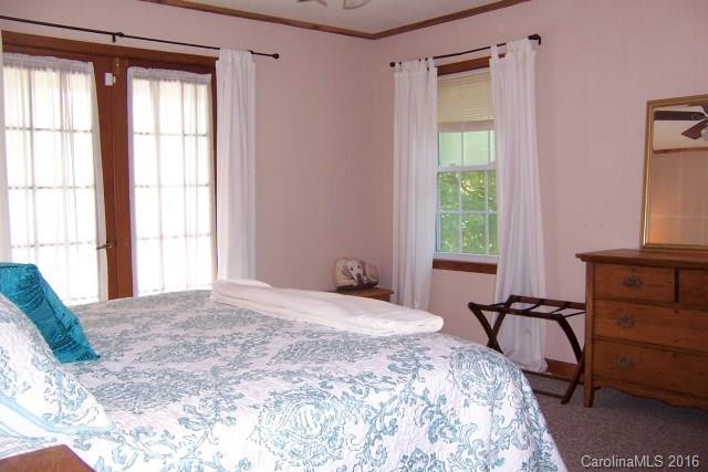 2316 Golf Course Road, Unit P8871 & P88151 Columbus, NC 28722 - Photo 18 of 21 a bedroom with a bed and a window