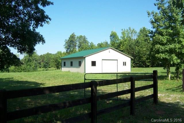 2316 Golf Course Road, Unit P8871 & P88151 Columbus, NC 28722 - Photo 21 of 21 a view of a house with backyard