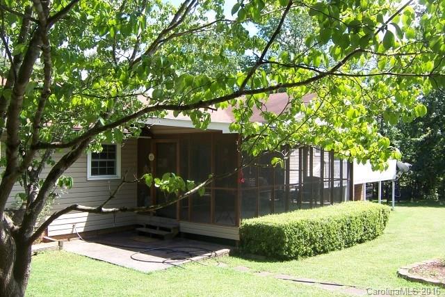 2316 Golf Course Road, Unit P8871 & P88151 Columbus, NC 28722 - Photo 5 of 21 a view of a house with a yard
