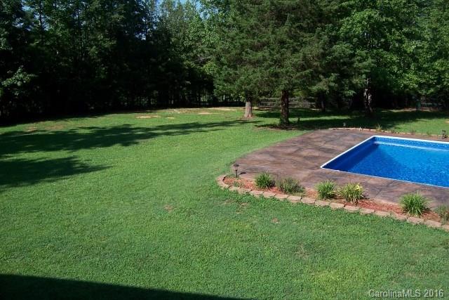 2316 Golf Course Road, Unit P8871 & P88151 Columbus, NC 28722 - Photo 9 of 21 a view of a backyard with green space