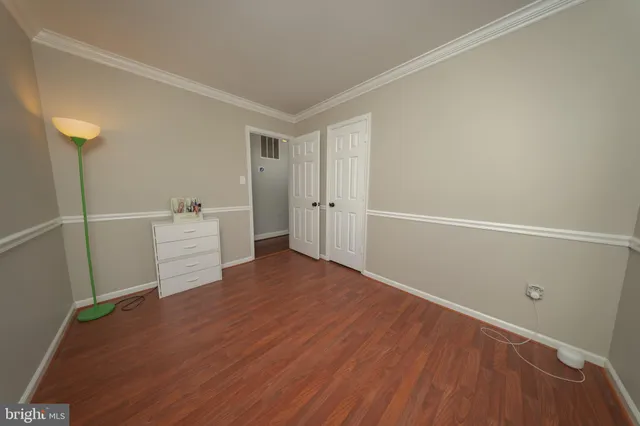 a view of a house with backyard and a garden