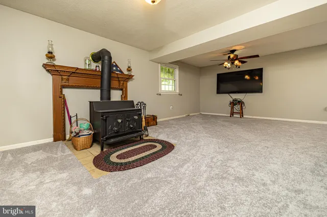 an aerial view of a house with pool yard outdoor and lake view
