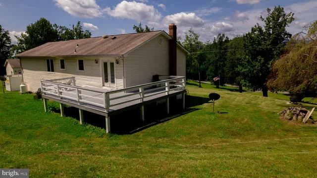a view of a city with lush green forest