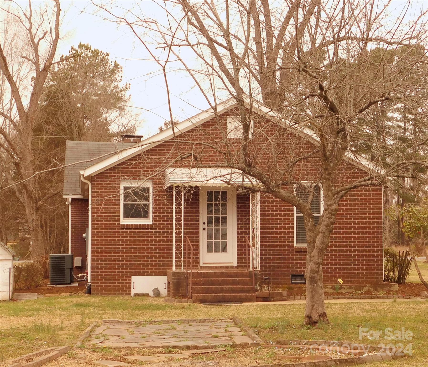 175 T T Brown Road Salisbury, NC 28146 - Photo 2 of 14 a front view of a house with a yard