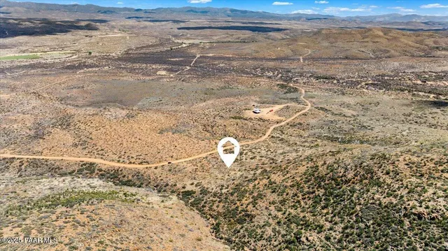 a view of mountains and valleys