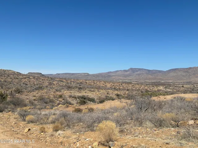 a view of mountain view with mountains in the background