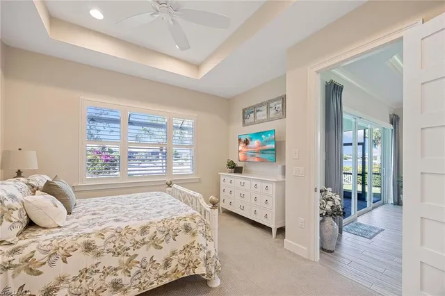 a bedroom with bed and window