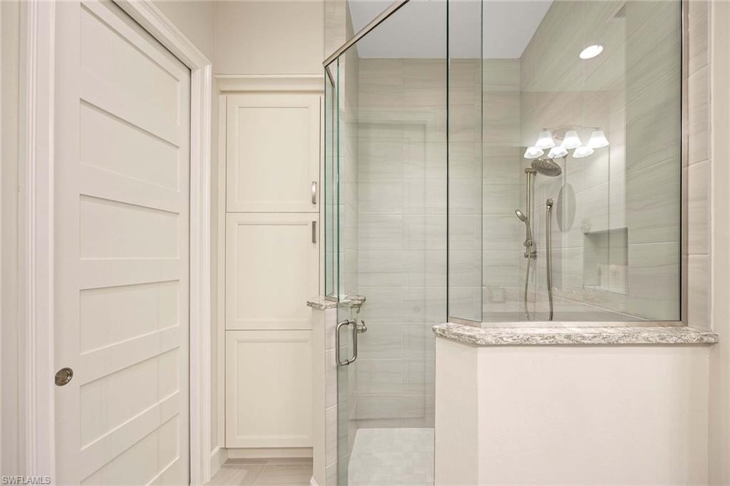5626 Elbow Avenue Naples, FL 34113 - Photo 20 of 48 a bathroom with a shower
