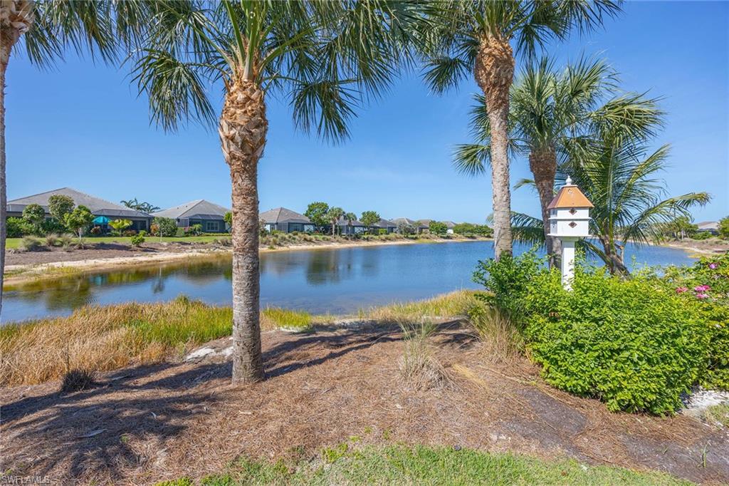 5626 Elbow Avenue Naples, FL 34113 - Photo 33 of 48 a view of a lake with outdoor space