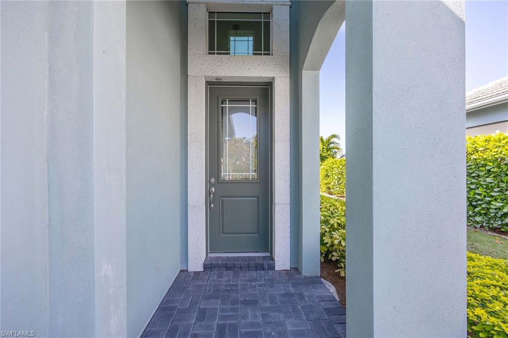 5626 Elbow Avenue Naples, FL 34113 - Photo 4 of 48 a view of an entryway door
