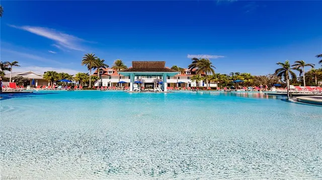 a group of people sitting in a backyard
