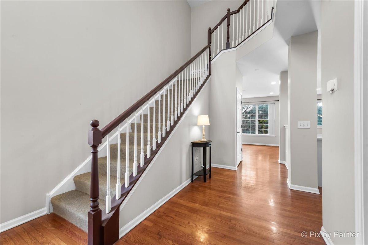486 Vaughn Circle Aurora, IL 60502 - Photo 3 of 40 a view of an entryway with wooden floor