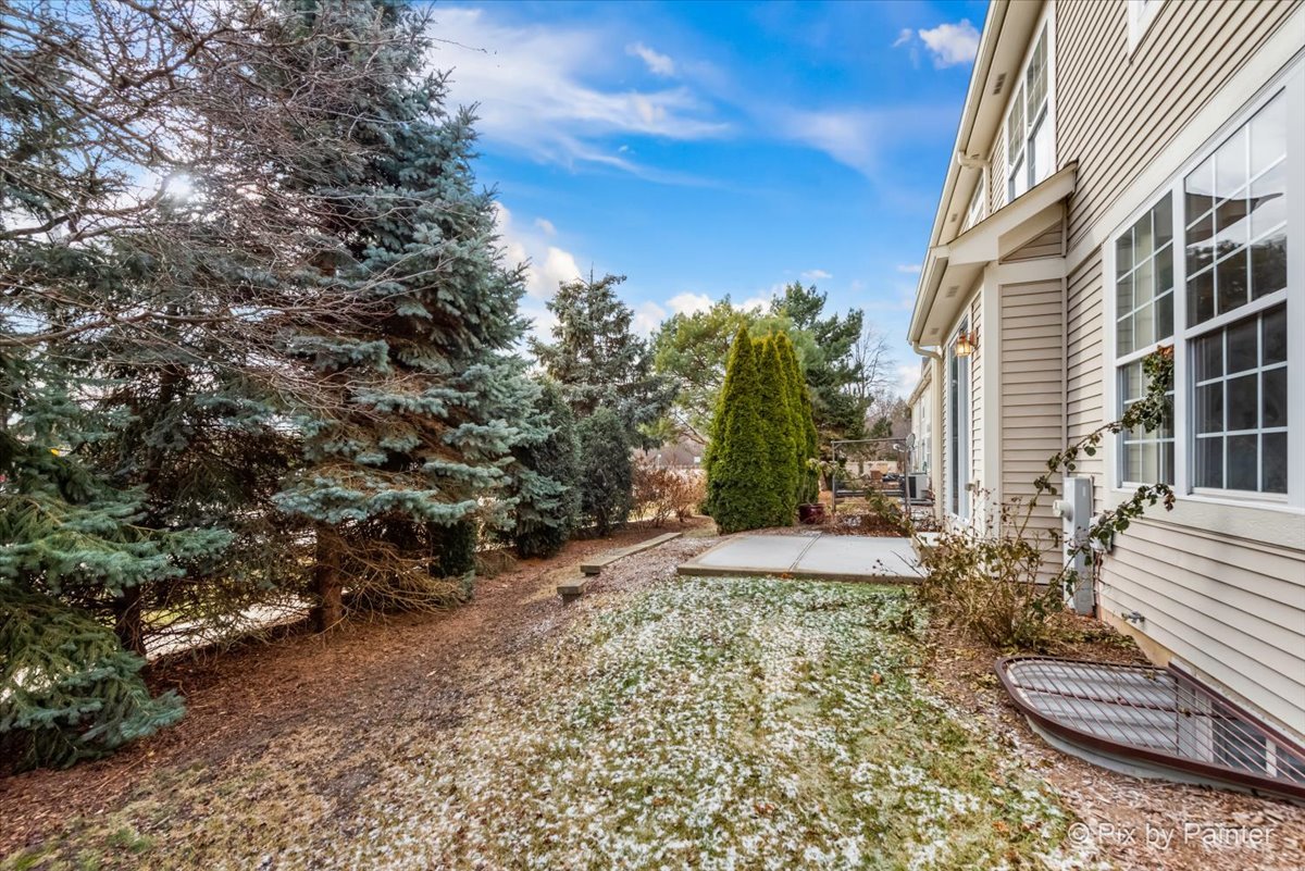 486 Vaughn Circle Aurora, IL 60502 - Photo 33 of 40 a view of a house with a yard