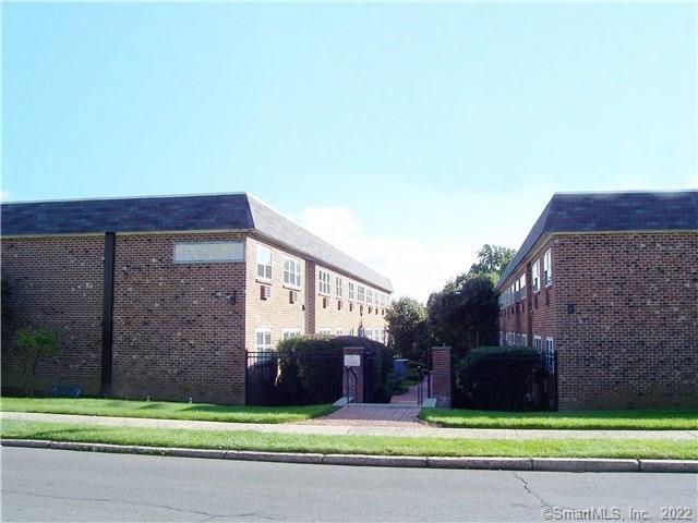 637 Cove Road, Unit D1 Stamford, CT 06902 - Photo 1 of 1 a view of a chairs in front of a building