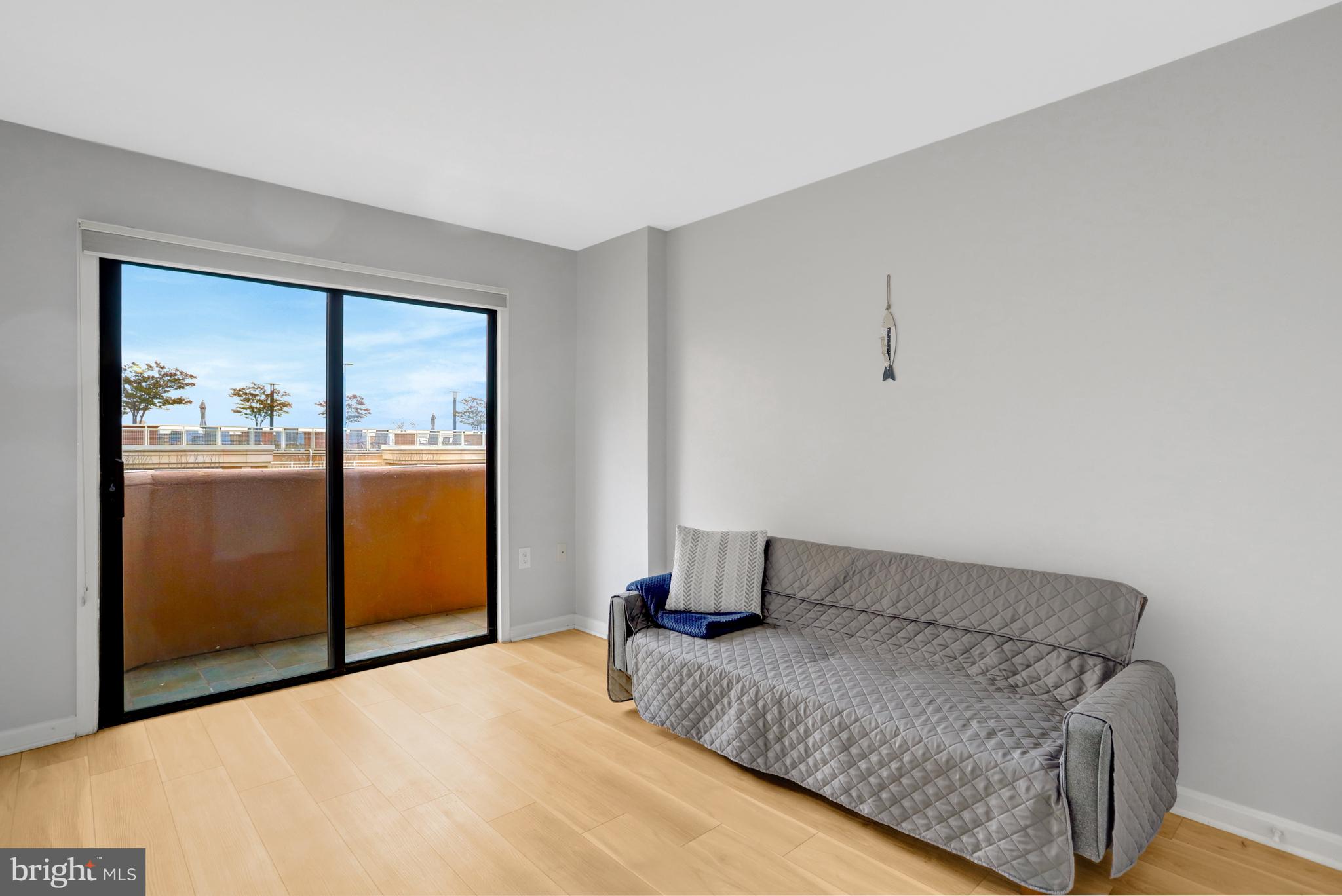 1301 North Courthouse Road, Unit 1108 Arlington, VA 22201 - Photo 27 of 49 a bedroom with a bed and window