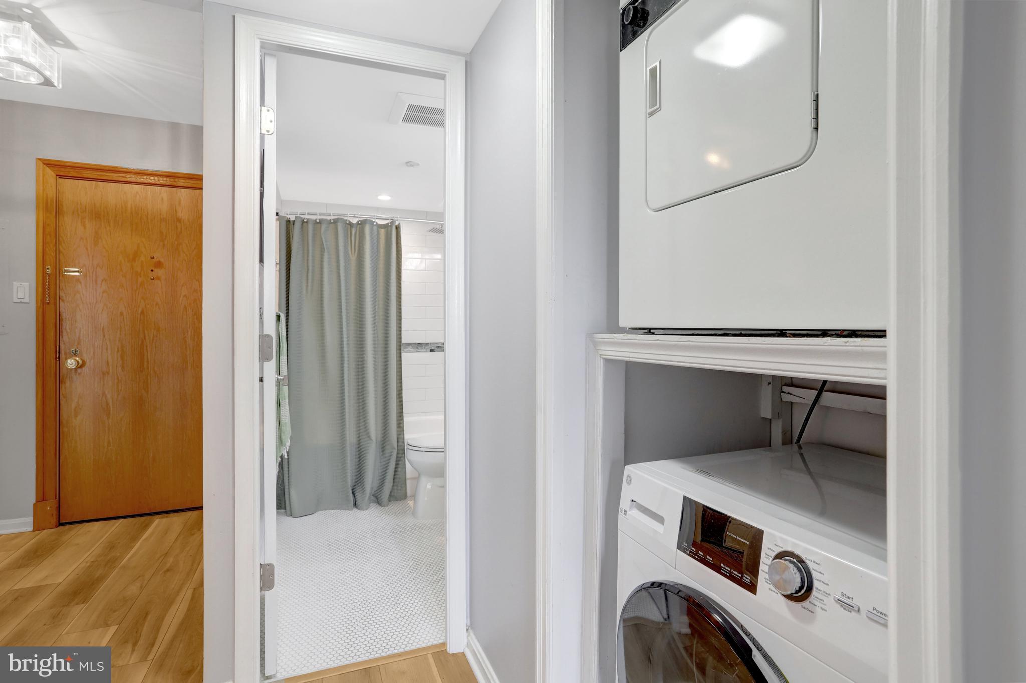1301 North Courthouse Road, Unit 1108 Arlington, VA 22201 - Photo 32 of 49 a utility room with dryer and washer