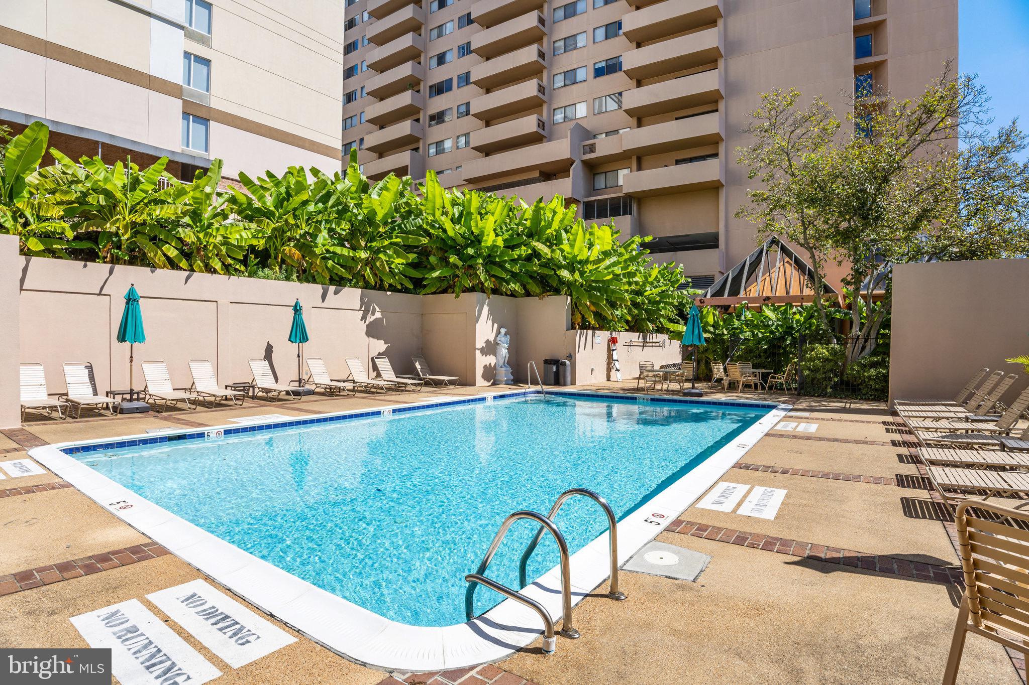 1301 North Courthouse Road, Unit 1108 Arlington, VA 22201 - Photo 35 of 49 a view of a swimming pool with a patio