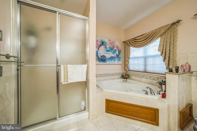 a bathroom with a bathtub and a sink