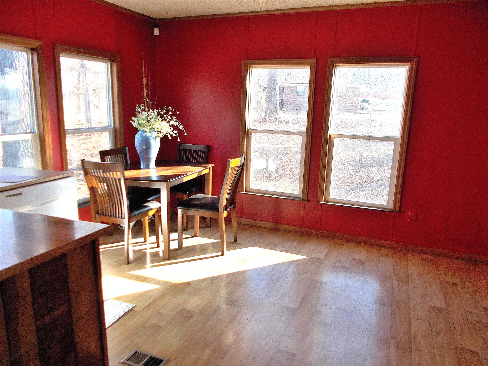 166 Duke Road Dickson, TN 37055 - Photo 13 of 25 a dining room with furniture a rug and a mirror
