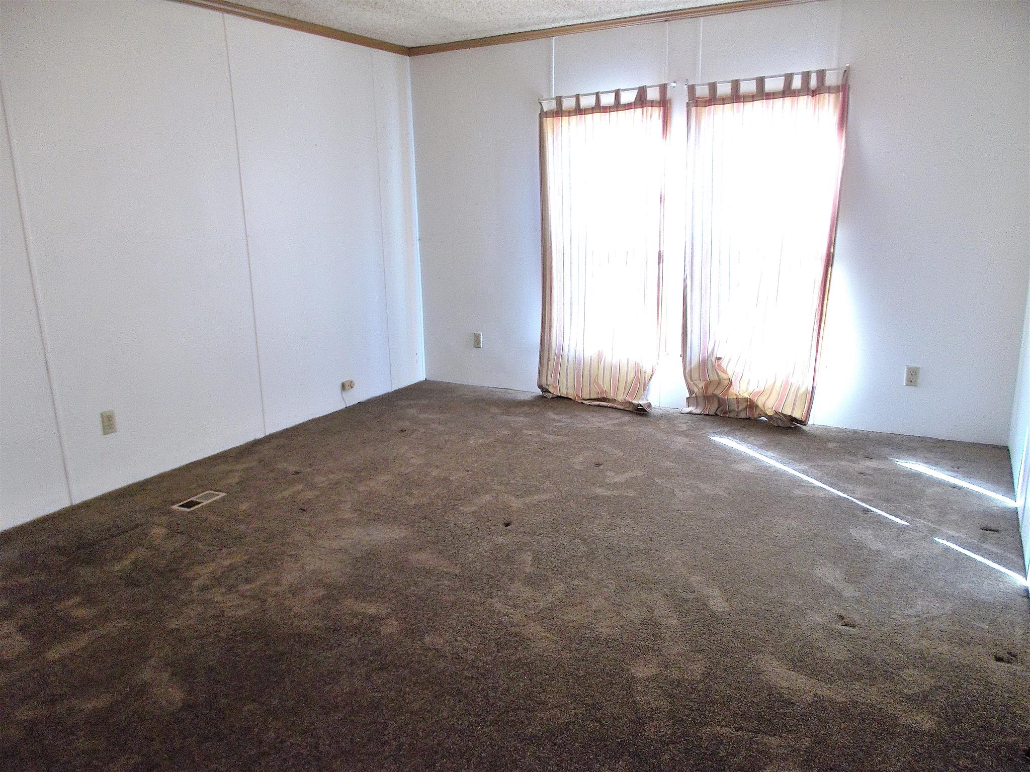 166 Duke Road Dickson, TN 37055 - Photo 16 of 25 a view of an empty room and a window