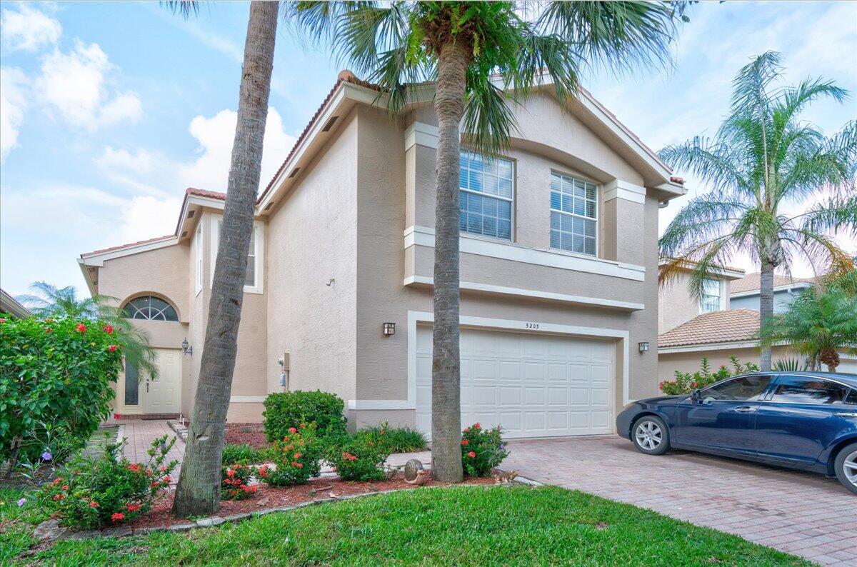 5203 Rising Comet Lane Greenacres, FL 33463 - Photo 1 of 34 01-1_5203 rising comet-1