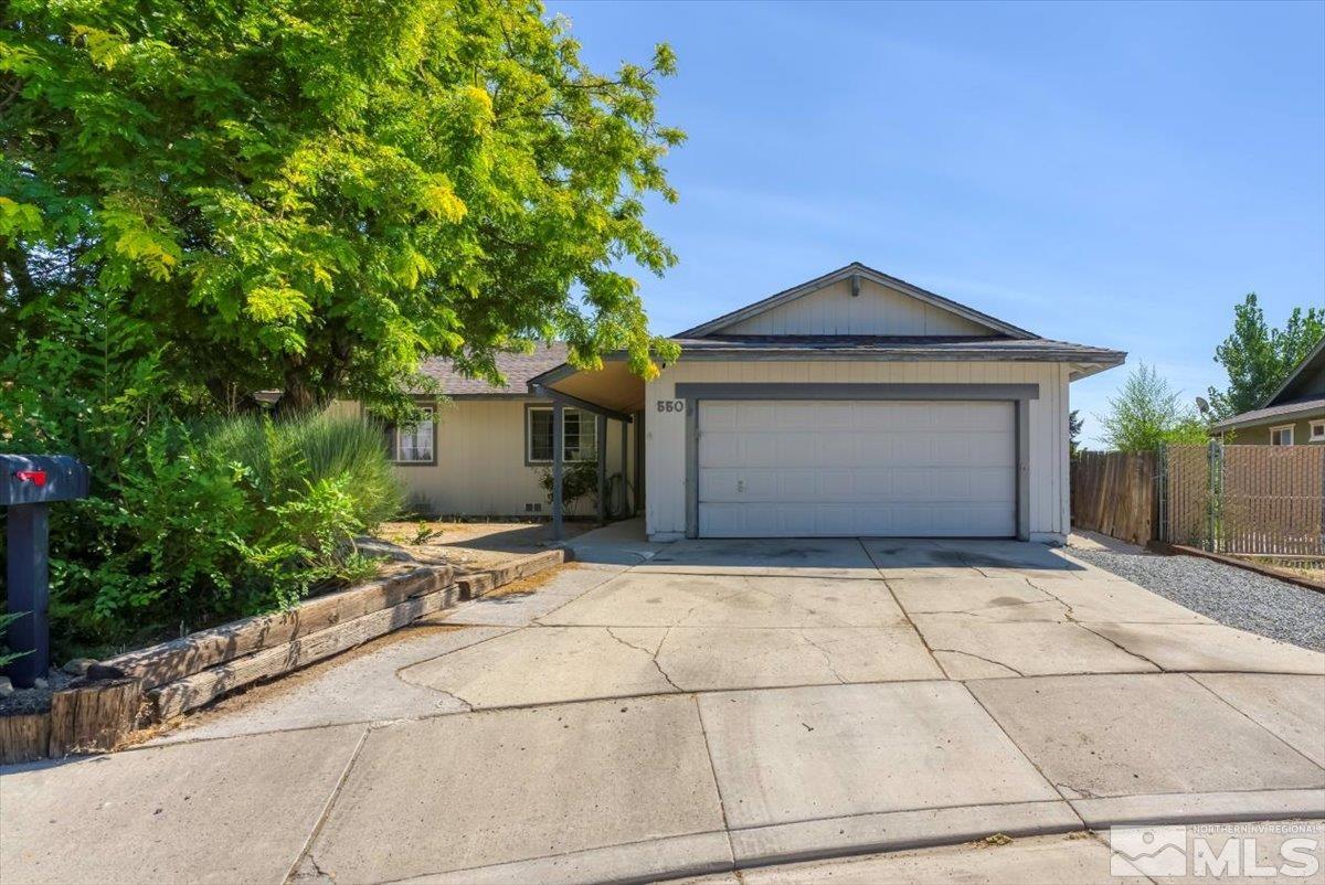 550 Ferol Way Reno, NV 89503 - Photo 1 of 34 a front view of a house with a garden