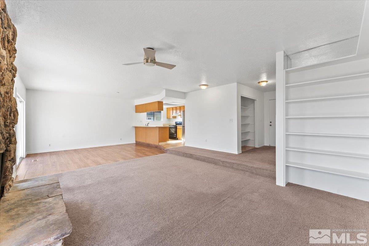550 Ferol Way Reno, NV 89503 - Photo 7 of 34 a view of empty room with a fireplace