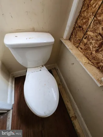 a bathroom with a toilet and a sink