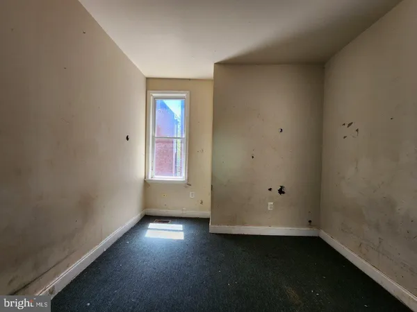 an empty room with a window