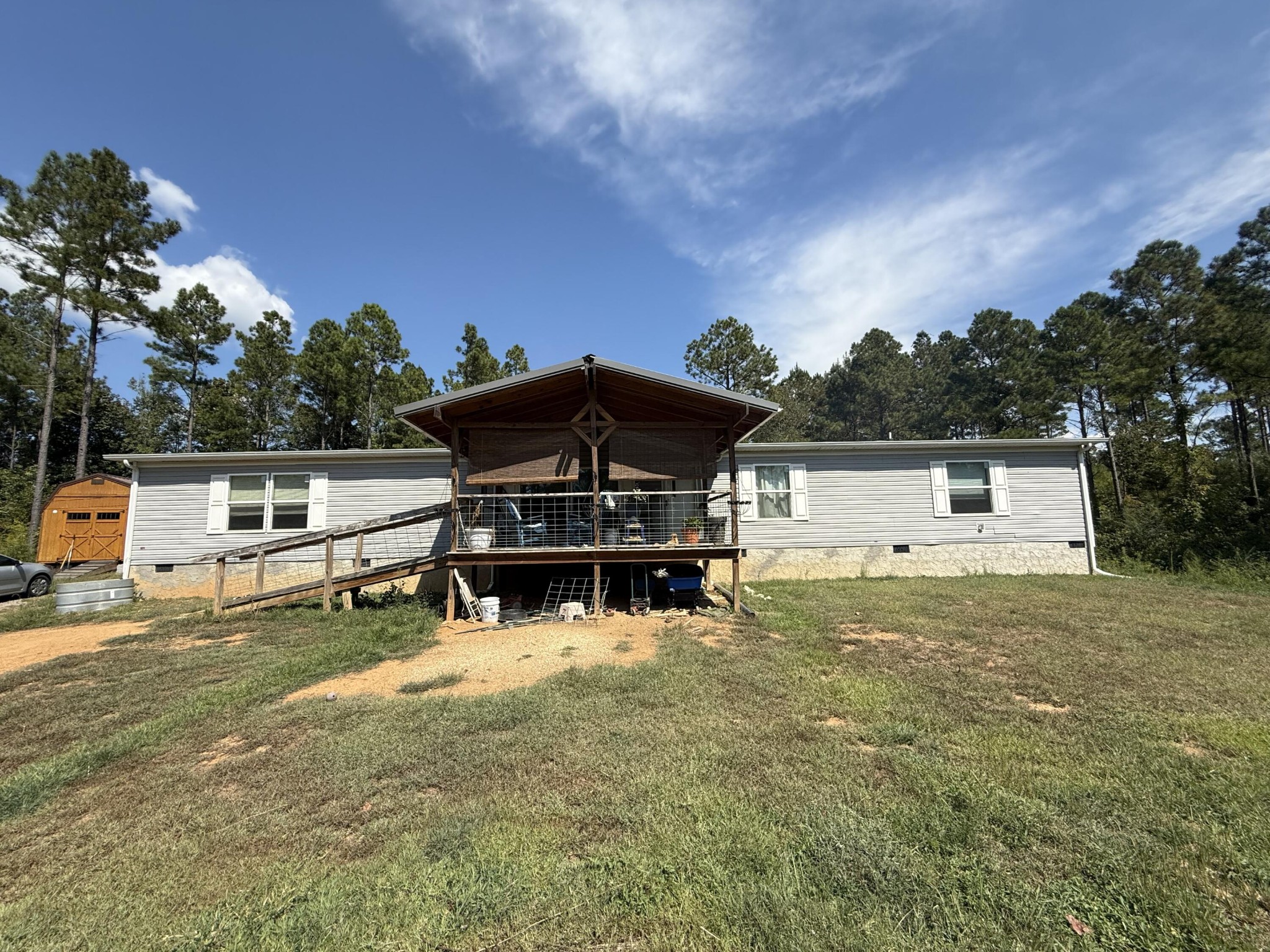 145 Pinhook Road Calhoun, TN 37309 - Photo 1 of 30 a backyard of a house with table and chairs