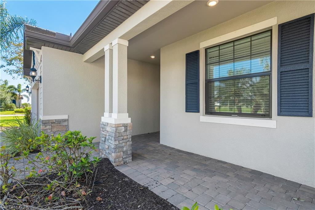 19952 Beverly Park Road Estero, FL 33928 - Photo 2 of 32 a view of a front door of the house