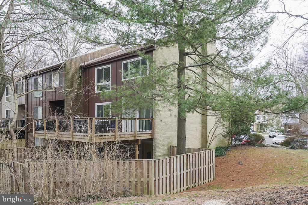 11041 Saffold Way Reston, VA 20190 - Photo 4 of 44 a house that has a tree in front of it