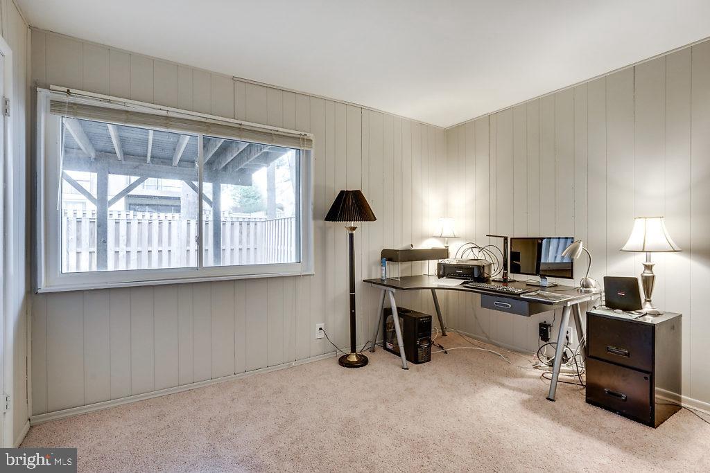 11041 Saffold Way Reston, VA 20190 - Photo 33 of 44 a view of a workspace with furniture and a window
