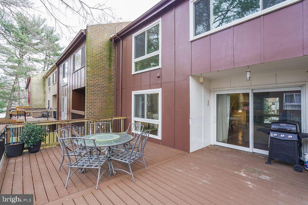 11041 Saffold Way Reston, VA 20190 - Photo 40 of 44 a view of a house with backyard and sitting area